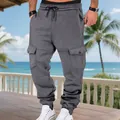 Primer plano de pantalones cargo grises con forro polar para hombre con cordón y bolsillos - Gris oscuro