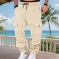 Pantalones cargo de hombre en forro polar pesado beige con múltiples bolsillos y cordón. - Albaricoque