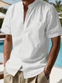 Close-up of white short sleeve Henley shirt for men showing cotton texture and pocket - S / Tops / White