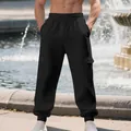Professional detail view of black men's cargo sweatpants with multi-pocket design and drawstring - S / Bottoms / Black