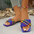 Detailed close-up view of colorful woven square-toe flat sandals in trendy street style design - 36 / Blue