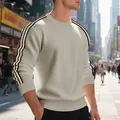 Detail van een kaki wafelgebreid sweatshirt met gestreepte biezen op de schouders - S / Tops / Licht kaki