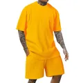 Completo da uomo arancione a due pezzi con trama a coste verticali per uno stile estivo casual. - Taglia S / Top E Pantaloni / Giallo