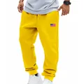 Bright yellow American flag patch jogger sweatpants for men with drawstring waist - S / Bottoms / Yellow