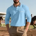 Elegante polo da uomo a maniche lunghe celeste con colletto grigio e taschino sul petto. - Azzurro