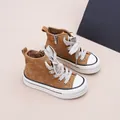 Détail de baskets montantes marron pour enfants avec fermeture éclair et semelle blanche - 26 / Chameau