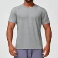 Camiseta deportiva de secado rápido y transpirable para hombre con cuello redondo en gris vigoré - Gris Mezcla