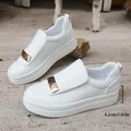 Women's white platform slip-on casual shoes featuring a stylish gold buckle detail - 36 / White