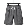 Vorderansicht graue atmungsaktive Cargo-Shorts für Herren mit elastischem Kordelzug - Dunkelgrau