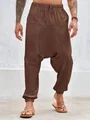 Detail der braunen Haremshose für Herren aus Baumwollleinen mit elastischen Bündchen - Kaffeebraun