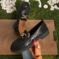 Mocasines negros elegantes con plataforma, una hebilla dorada y diseño en relieve - 36 / Clip Negro