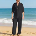 Ensemble en lin noir pour homme avec chemise Henley et pantalon ample sur une plage - S / Haut Et Bas / Noir