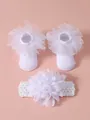 Detalle de calcetines blancos de encaje para bebé y diadema con flor grande a juego - Talla S (0-1 Año) / Blanco Y Diadema
