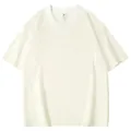 Detail view of a premium 240g cotton white T-shirt with drop shoulder design. - Apricot