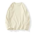 Clean view of a cream-colored men's long-sleeved T-shirt with soft fabric texture - M / Tops / Apricot