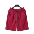 Men's red breathable linen drawstring beach shorts with comfortable elastic waist. - S / Bottoms / Red