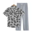 Conjunto hawaiano gris para hombre con camisa estampada de palmeras y pantalón - Gris