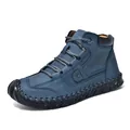 Detail view of men's blue leather ankle boots with hand-stitched seams and rope laces. - 38 / Handcrafted Boots (8806) / Dark Blue