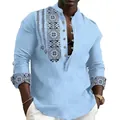 Close-up of the intricate ethnic geometric print on this light blue Mandarin collar shirt. - S / Tops / Blue