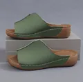 Side view of elegant green women's wedge platform sandals with white stitching details - 35 / Green