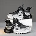 Stylish boys' running shoes featuring a rotating buckle system in black and grey - Black and Gray