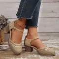 Detail view of beige block-heel shoes with delicate laser-cut floral patterns and ankle strap - 36 / Brown