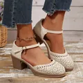 Elegant beige chunky heel Mary Jane shoes featuring artistic laser-cut floral patterns - 36 / Off White