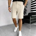 Detail of men's waffle knit shorts in beige with breathable textured fabric and drawstring. - S / Bottom (DK100) / Khaki