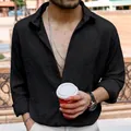 Detailed close-up of a men's black crinkle fabric casual long-sleeved lapel shirt - M / Tops / Black