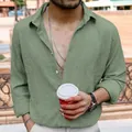 Detailed view of a men's olive green long sleeve shirt in crinkle fabric with lapel design - M / Tops / Army Green