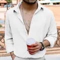 Close-up detail of the white wrinkled texture on a men's casual long sleeve lapel shirt - M / Tops / White