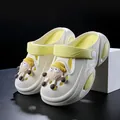 Cream and yellow children's anti-slip garden clogs featuring cute 3D cartoon character - Beige
