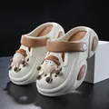Cream children's clogs featuring cute sheep cartoon charms and brown heel straps - Beige Khaki