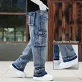 Men's loose blue cargo jeans featuring multiple pockets and a trendy raw hem design - 38 / Bottoms / Light Blue (Raw Edge)