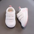 Comfortable white leather toddler walking shoes with soft soles and pink accents - Pink