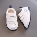 Toddler soft sole walking shoes in white leather with blue accents and velcro straps - Dark Blue