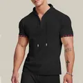 Detailed view of men's black waffle knit hooded T-shirt with plaid cuff accents - S / Tops / Black