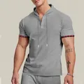 Detail shot of grey waffle knit hooded t-shirt for men with adjustable drawstrings. - S / Tops / Gray