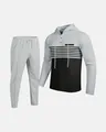Close-up of men's two-piece waffle knit tracksuit with color-blocked hoodie and joggers - Gray