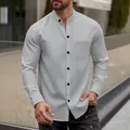Grey waffle knit men's long sleeve shirt featuring a stand collar and button-down front - S / Tops / Gray