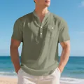 Breathable men's olive green linen Henley shirt with chest pocket detail on beach - S / Tops / Army Green