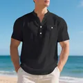 Casual black short-sleeved linen Henley shirt for men styled for a summer beach look. - Black