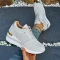 Light grey wedge sneakers for women featuring metallic accents and thick white platform soles. - 36 / Gray