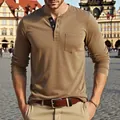 Detail of men's casual khaki long sleeve Henley shirt with chest pocket and button placket. - Brown