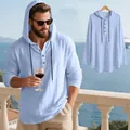 Detail view of a men's light blue breathable linen hooded henley shirt for beach vacations - Light Blue