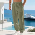 Detail of olive green men's linen joggers with drawstring waist and elastic cuffs - Army Green