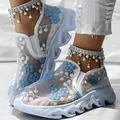 Detail showing white breathable mesh sneakers with blue floral embroidery and thick platform soles - 37 / Sky Blue