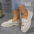 Close-up view of comfortable women's cream suede flat loafers with flexible soft sole - 43 / Tassel Metal Buckle Loafers (1012) / Off White