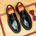 Premium black glossy leather loafers with platform sole and geometric strap detail - 37 / Black