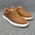 Premium brown genuine leather men's casual sneakers with textured grain and white sole - 37 / Brown